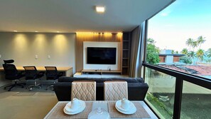 Living area - Flat FM20 Cabo Branco Deluxe - By Almare (João Pessoa)