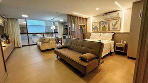 Apartment | Living area | TV - Flat FM20 Cabo Branco Deluxe - By Almare (João Pessoa)
