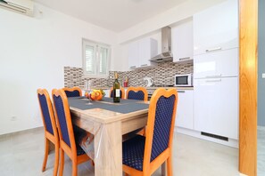 Apartamento (Apartments Radojković Lumbarda - Com) | Sala de jantar