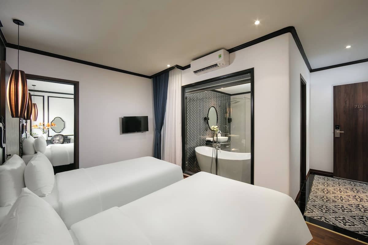 Family Room, 2 Bedrooms | Premium bedding, pillowtop beds, minibar, desk