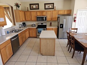 Villa, Multiple Bedrooms | Private kitchen - Spacious 7 Br, 4.5 Br Retreat With Pool 7 Bedroom Condo by RedAwning (Kissimmee)