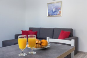 Apartment (Apartments Oleander Sea View - One Be) | Living room | 32-inch flat-screen TV with cable channels - Apartments Oleander Sea View (Konavle)
