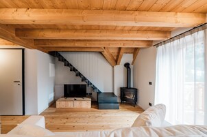 Apartamento exclusivo | Sala de estar | Una televisión de pantalla plana