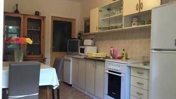 Apartment (Comfort Two-Bedroom Apartment with Ga) | Private kitchen | Fridge
