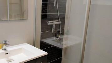 Hair dryer, towels, soap, shampoo