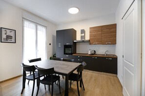 Fridge, oven, electric kettle, cookware/dishes/utensils