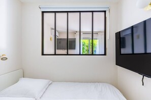 1 bedroom, desk, iron/ironing board, travel cot