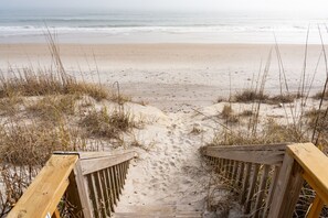 On the beach, sun loungers, beach towels