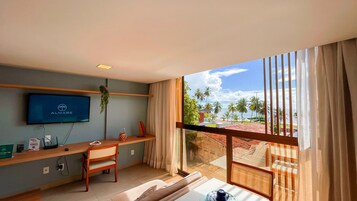 Apartamento Deluxe | Zona de estar | Una televisión