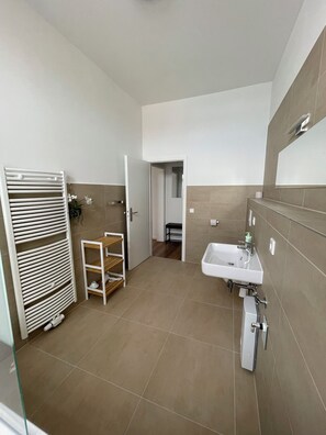 Hair dryer, towels, soap, shampoo