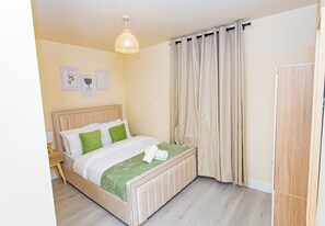 Casa | 3 dormitorios, tabla de planchar con plancha, wifi gratis y ropa de cama