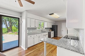 Fridge, microwave, oven, stovetop - Tranquil Wooded Retreat Overlooking Truman Lake only 2 minutes from Warsaw, MO  (Warsaw)