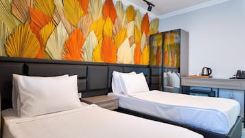 Family Suite, 2 Bedrooms, Balcony, Sea View | 1 bedroom, free minibar items, individually furnished, desk