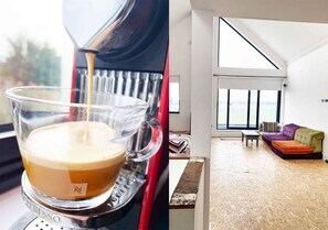 Relax in a bright, airy space with a large window and contemporary furniture.