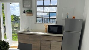 Studiosuite, hageutsikt | Eget kjøkken