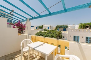 Family Apartment, Balcony, Garden View | Terrace/patio