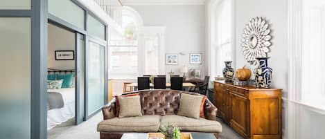 Grand Apartment, 2 Bedrooms, Courtyard View | Living area | 42-inch flat-screen TV with digital channels