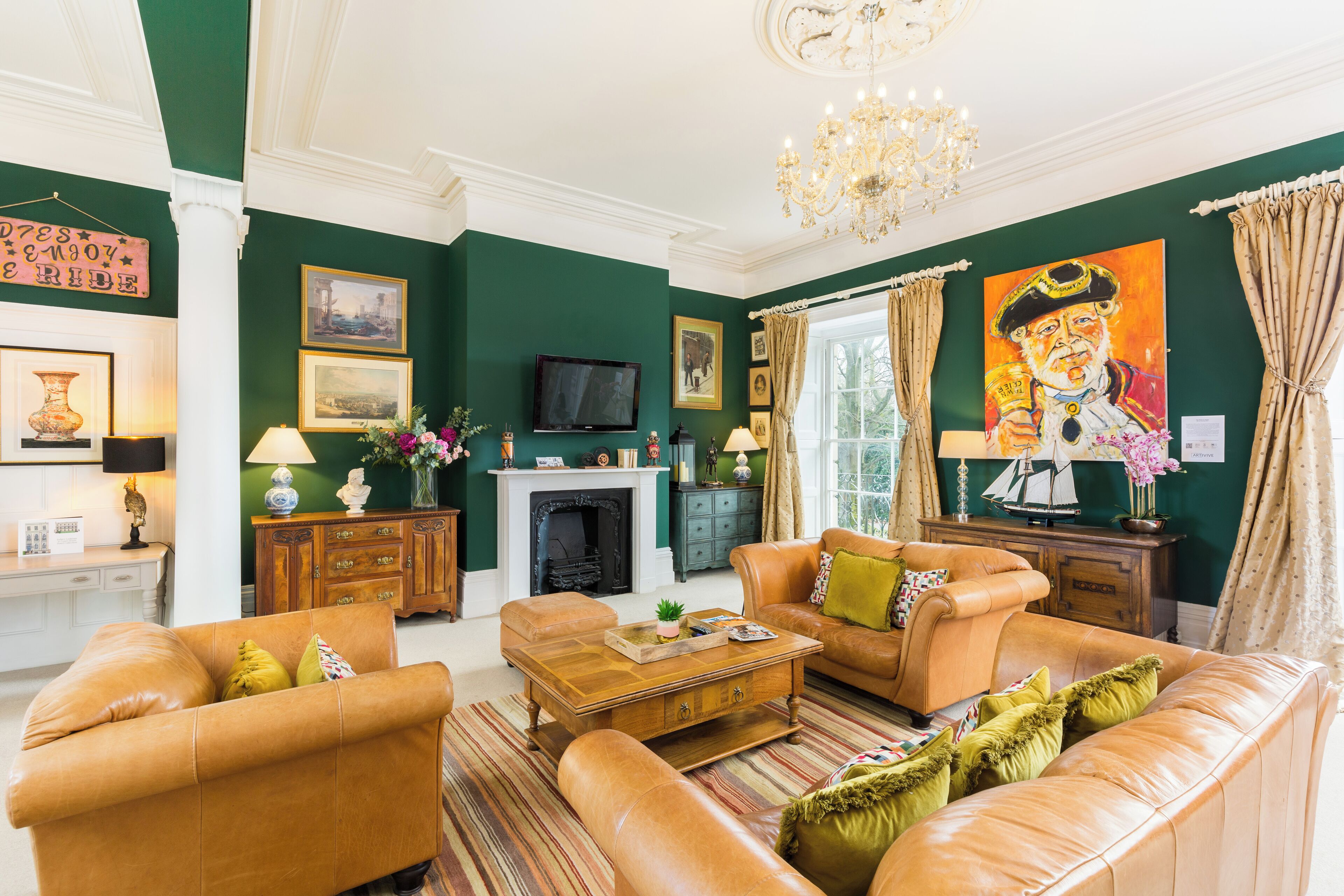 ハネムーン アパートメント キングベッド 1 台ソファーベッド付き パークビュー | リビングルーム | 42 インチの薄型テレビ (デジタル放送視聴可)