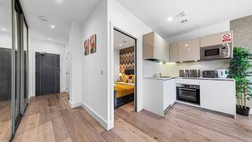 Apartment | Private kitchen | Fridge, microwave, oven, stovetop