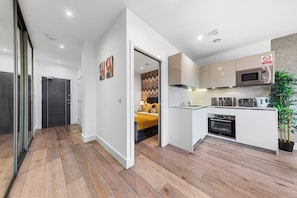 Appartamento | Cucina privata | Frigorifero, microonde, forno, piano cottura