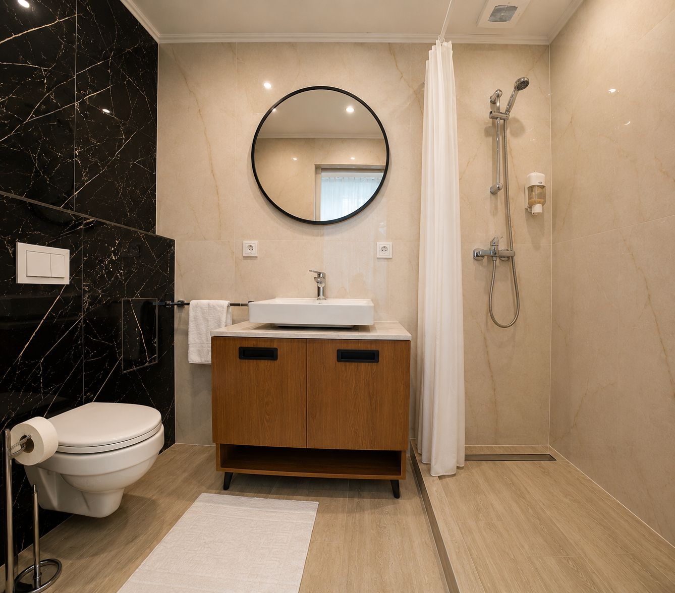 A modern bathroom with a toilet, sink, mirror, shower, and marble walls.