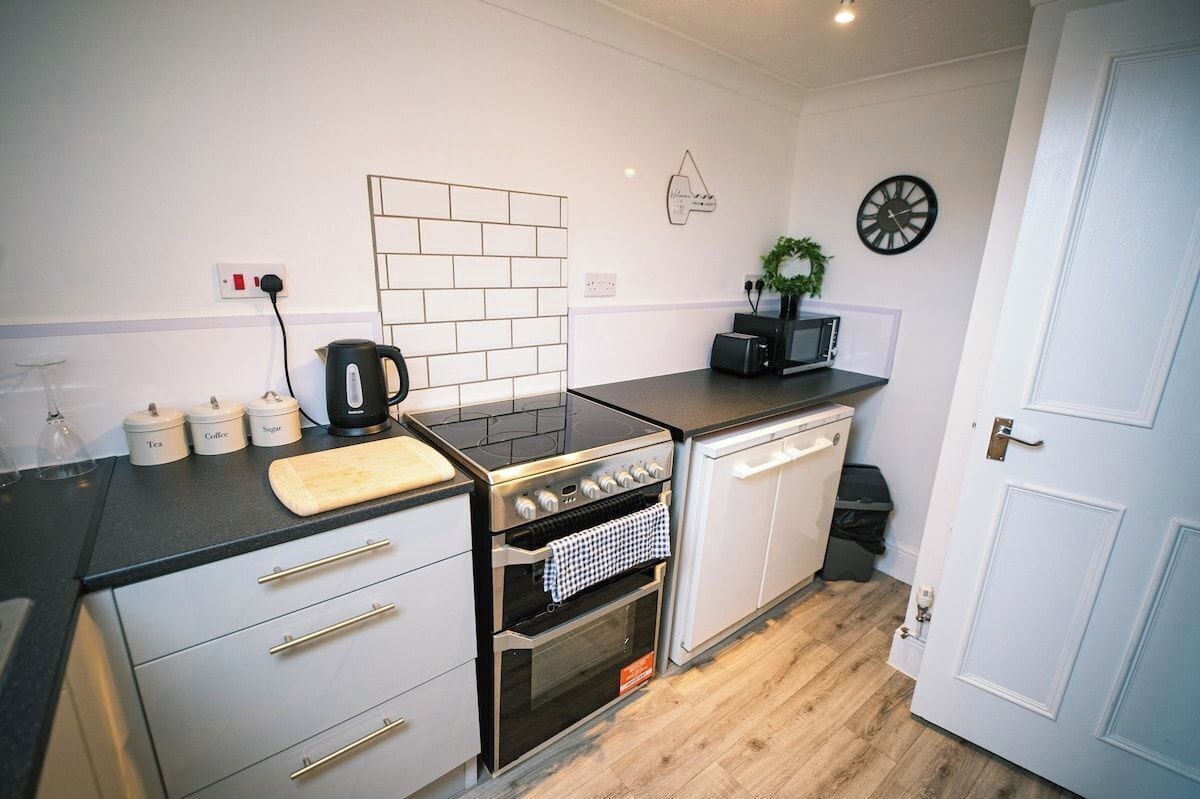 Fridge, microwave, toaster, cookware/dishes/utensils