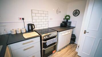Fridge, microwave, toaster, cookware/dishes/utensils