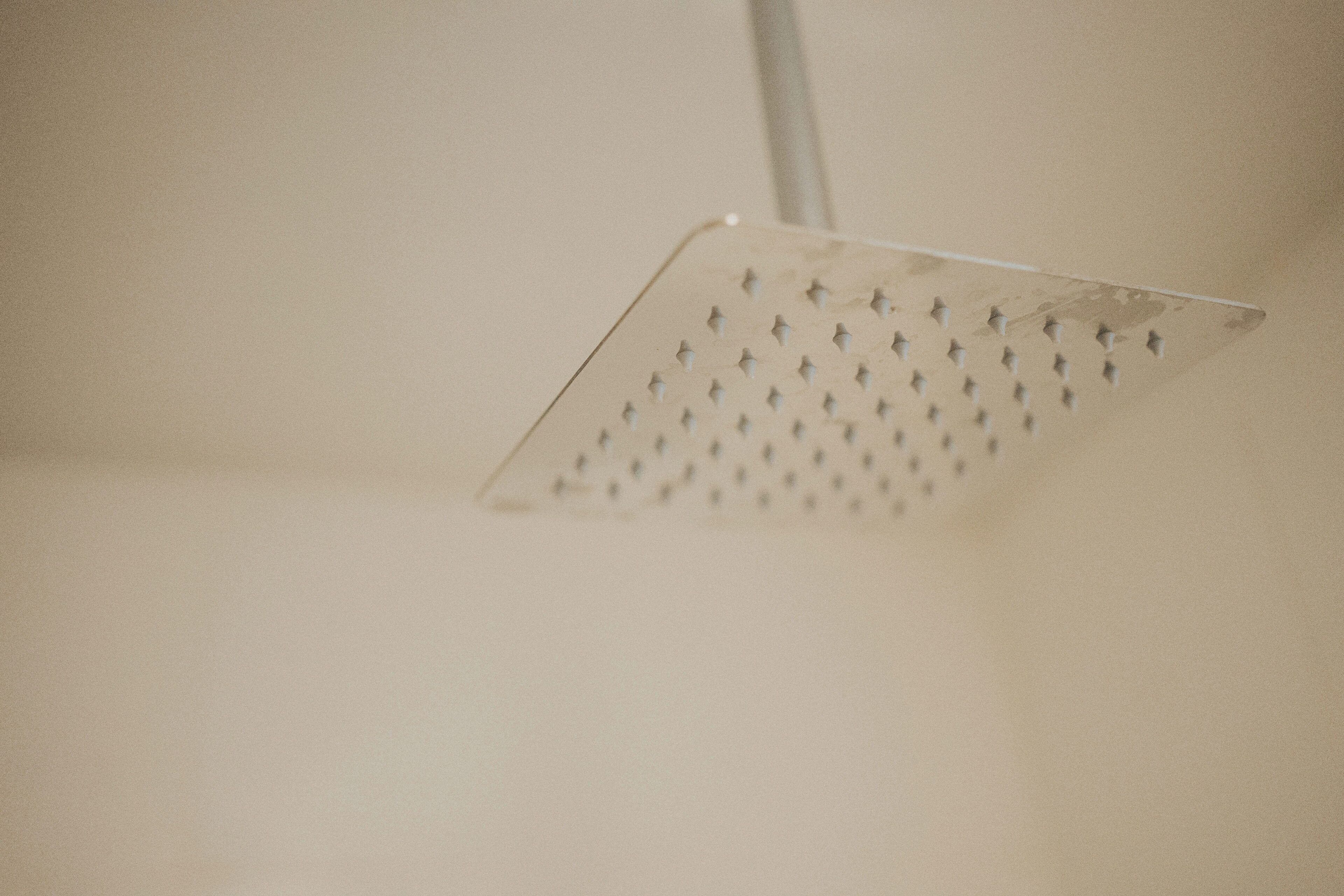 A showerhead with multiple nozzles.