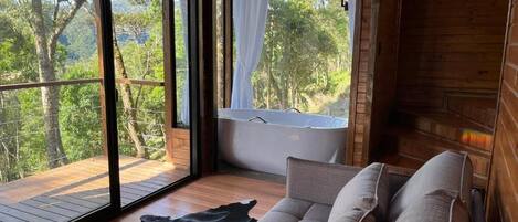 Cabane Deluxe, véranda, vue jardin