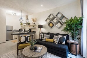 Maison Standard, 1 très grand lit et 1 canapé-lit, cuisine, vue ville | Salle de séjour