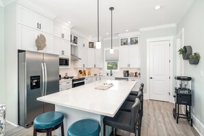 Fridge, microwave, oven, stovetop - Just steps away - beach, pool, & attractions on the Emerald Isle! New Home.  (Emerald Isle)