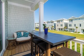 Outdoor dining - Just steps away - beach, pool, & attractions on the Emerald Isle! New Home.  (Emerald Isle)