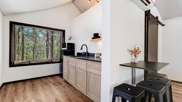 Fridge, stovetop, coffee/tea maker, cookware/dishes/utensils