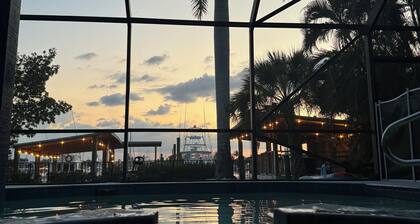 Waterfront Home on the Harbor with a Pool, Boat Dock & Pet Friendly!