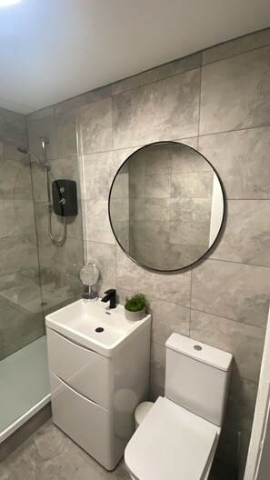 Shower, towels, soap, shampoo