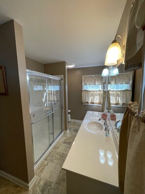 Shower, hair dryer, towels, soap