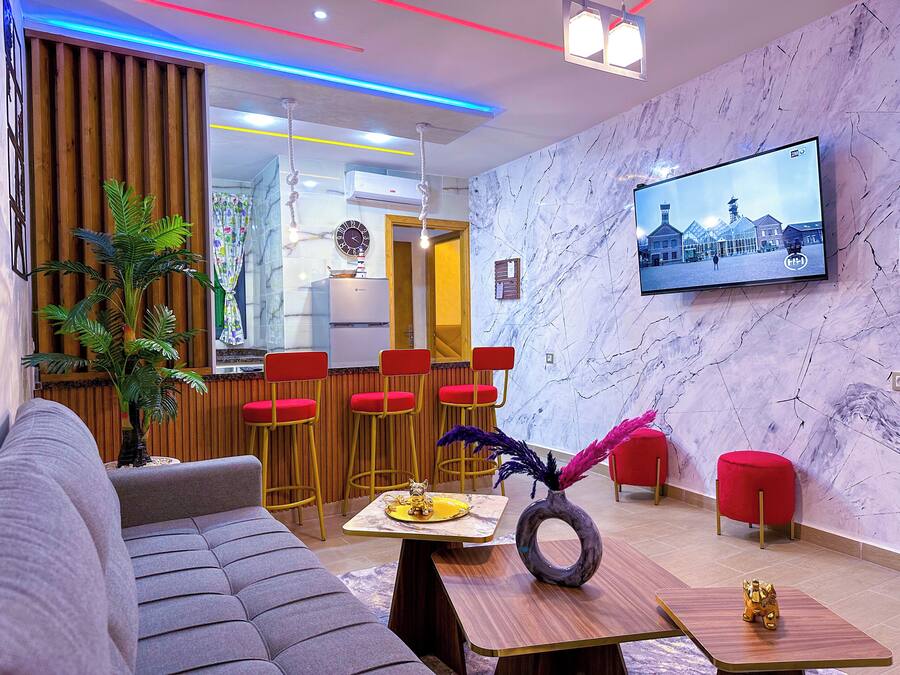 City Apartment, 2 Bedrooms, Balcony, Garden View | Living area | 65-inch Smart TV with satellite channels, Netflix, streaming services