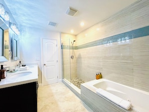 Shower, jetted tub, hair dryer, towels