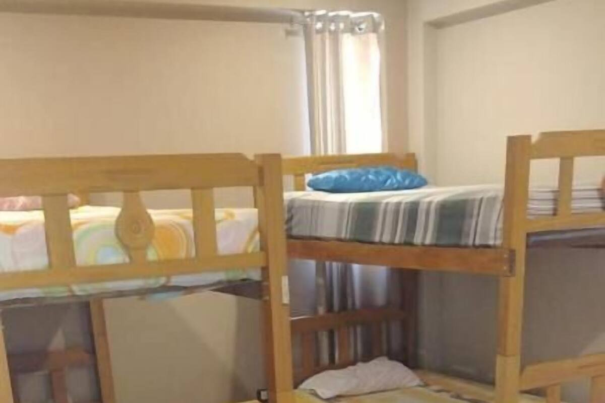 Premium bedding, down duvets, desk, laptop workspace