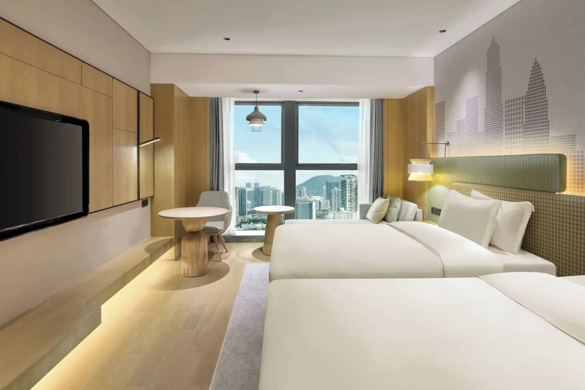 Premium bedding, down comforters, memory foam beds, in-room safe