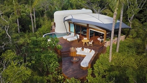 A modern house with a pool, surrounded by lush greenery. - Naviva, A Four Seasons Resort, Punta Mita, Mexico - All Inclusive (Punta de Mita)