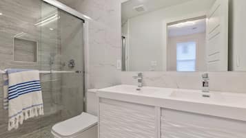 Hair dryer, towels, soap, shampoo