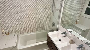 Hair dryer, towels, soap, shampoo