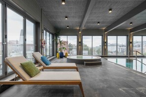 Indoor pool, open 2:00 PM to 9:00 PM, pool loungers - voco Stockholm Kista by IHG (Kista)