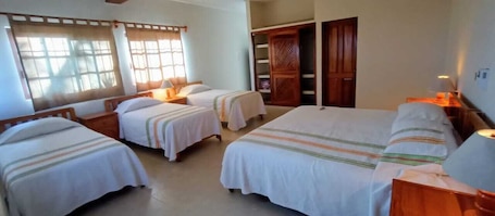Family Room | Egyptian cotton sheets, premium bedding, down comforters. Hotel Casa Rush