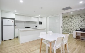 Dining - Cozy 2 Bedroom Apartment+study located in Surfers (Surfers Paradise)