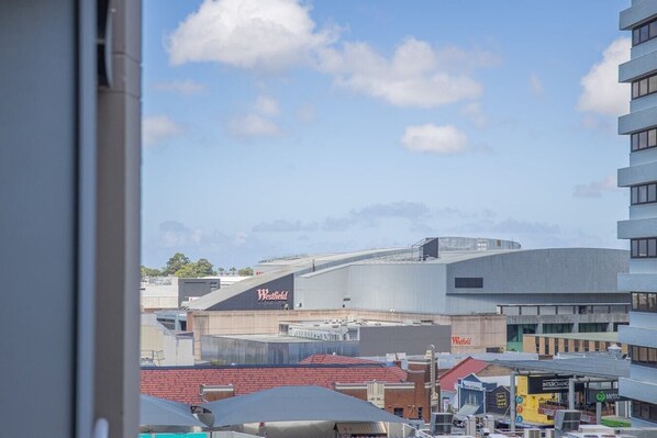 A view of a large industrial building with the name 'Westfield' prominently displayed.