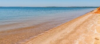 Secluded, private get away. Short walk to the beach down a private trail.