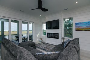 Smart TV, fireplace - Carolina Mile:Luxurious 4BR/3.5BA Marsh-Front Retreat with Private Pool & Elevator on Edisto Beach (Edisto Beach)