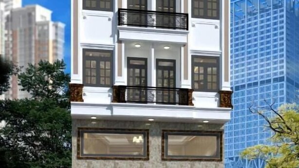 A multi-story building with a grand entrance, large windows, and a modern glass facade. - MoonStay (Ho Chi Minh City)